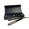 Nyitott Magic Steaming Iron díszdoboz a hajvasalóval és a doboz belső ismertetőjével